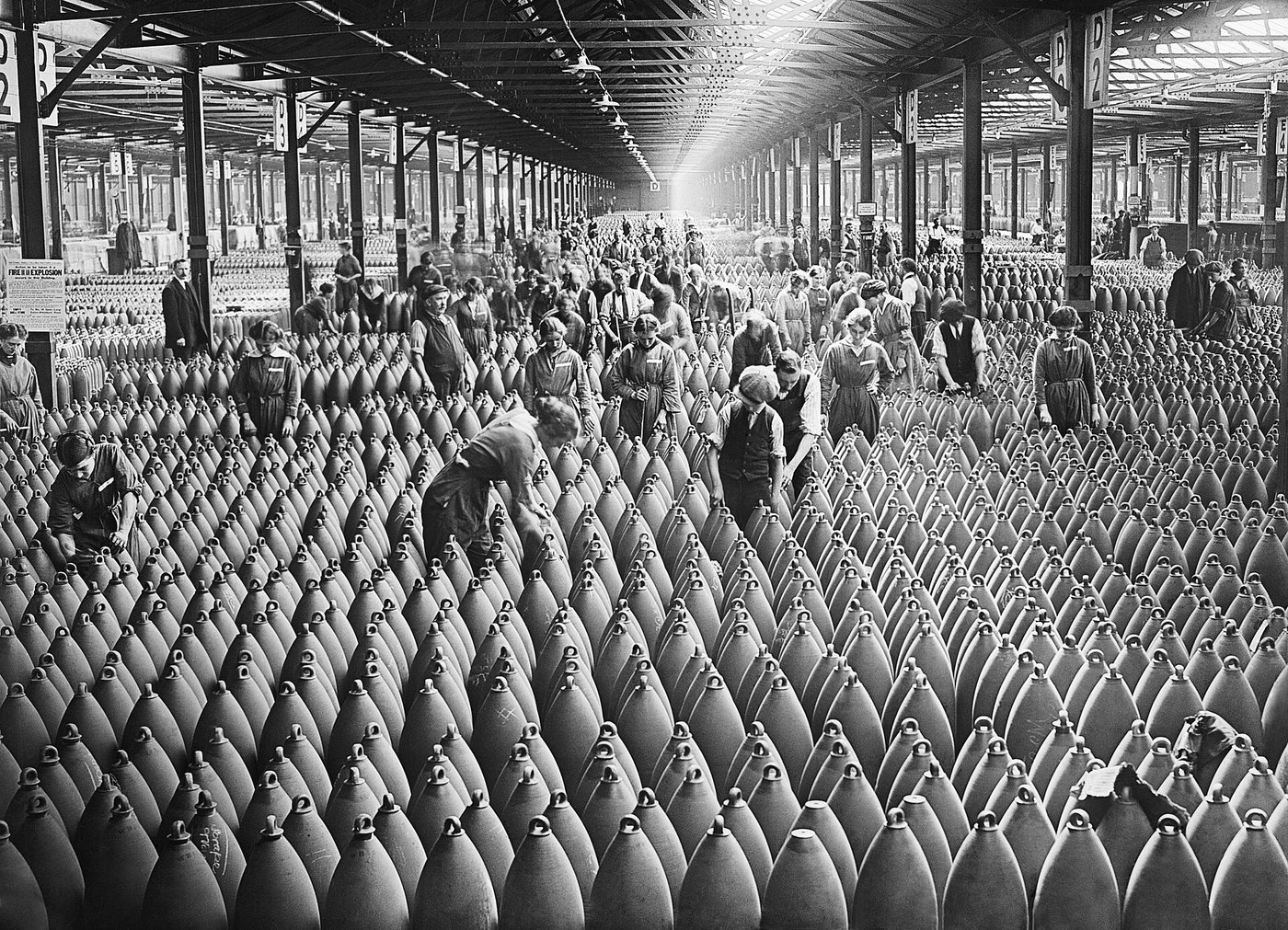 Women munitions workers in a shell warehouse at National Shell Filling Factory No. 6, Chilwell, Nottinghamshire, 1917.