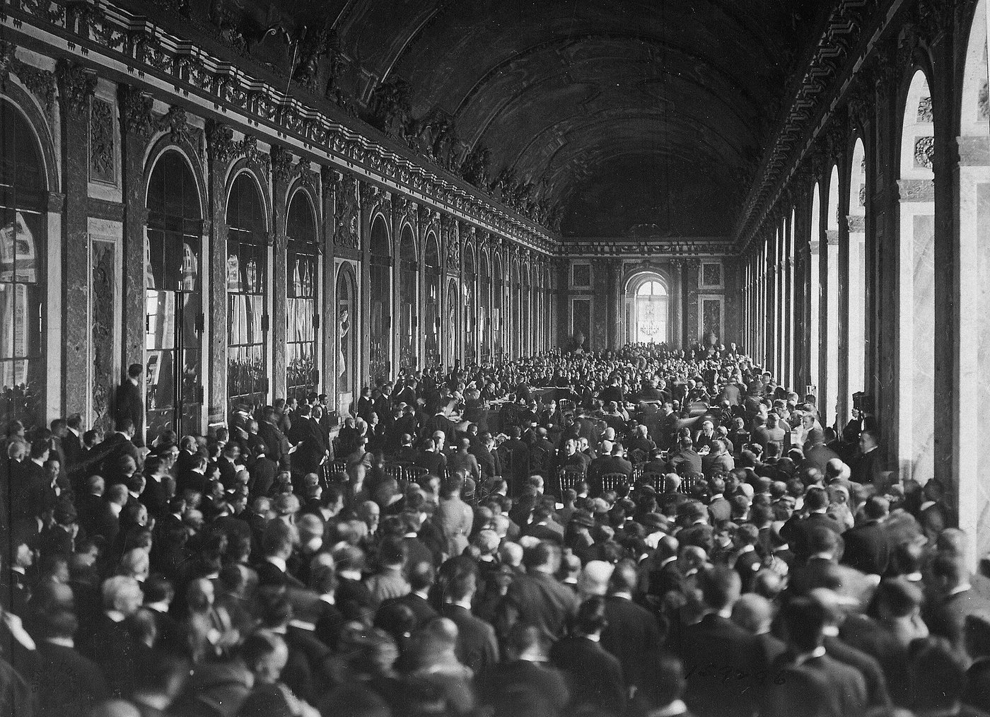 The Allied and German delegations signing the Treaty of Versailles in the Hall of Mirrors, Palace of Versailles, June 28, 1919.