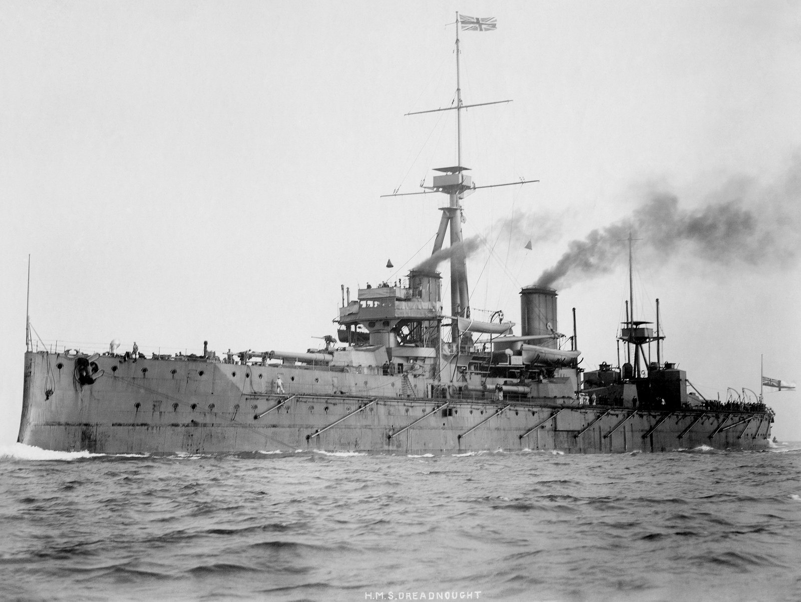 HMS Dreadnought under way at sea, photographed around 1906-07, showing her distinctive single-caliber gun turrets