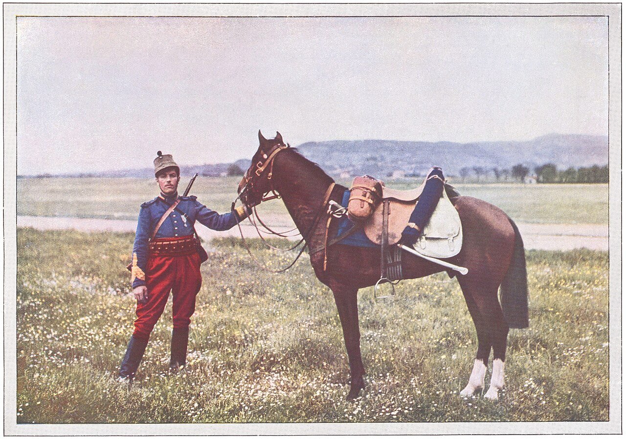 A French Chasseurs d'Afrique cavalry brigadier with his horse, photographed during the Battle of the Marne, 1914.