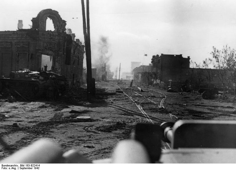 The ruined cityscape of Stalingrad during the battle, 1942 — shattered apartment blocks and rubble.