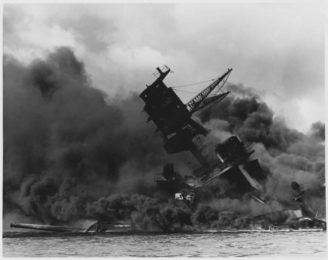USS Arizona burning and sinking at Battleship Row, Pearl Harbor, after the Japanese attack of December 7, 1941.