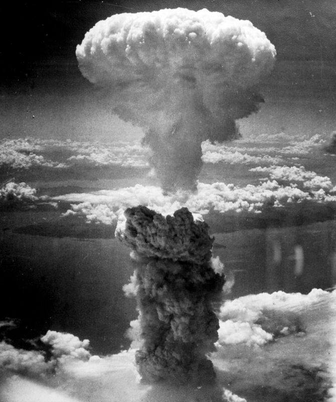 The mushroom cloud over Nagasaki, photographed from a nearby observation aircraft, August 9, 1945.