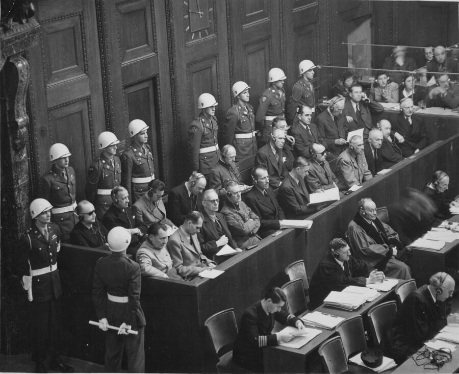 An overhead view looking down on the defendants' dock at the International Military Tribunal courtroom in Nuremberg, circa 1945-46.