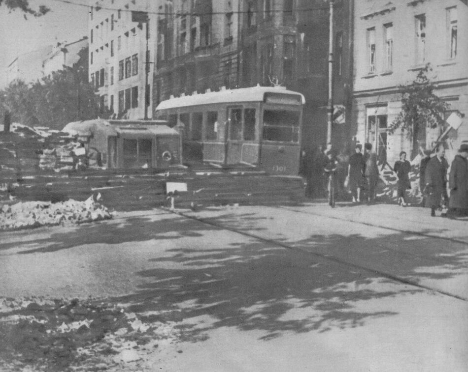 A civilian-built street barricade at the corner of Marszałkowska and Piękna streets, Warsaw, during the September 1939 siege.