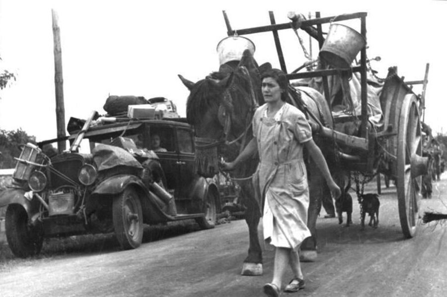 French refugee carts, loaded with belongings, during the mass civilian flight south ahead of the German advance, June 19, 1940.