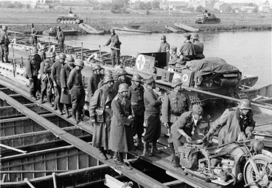 German 1st Panzer Regiment crossing a pontoon bridge over the Meuse River at Floing, immediately north of Sedan, May 14, 1940.